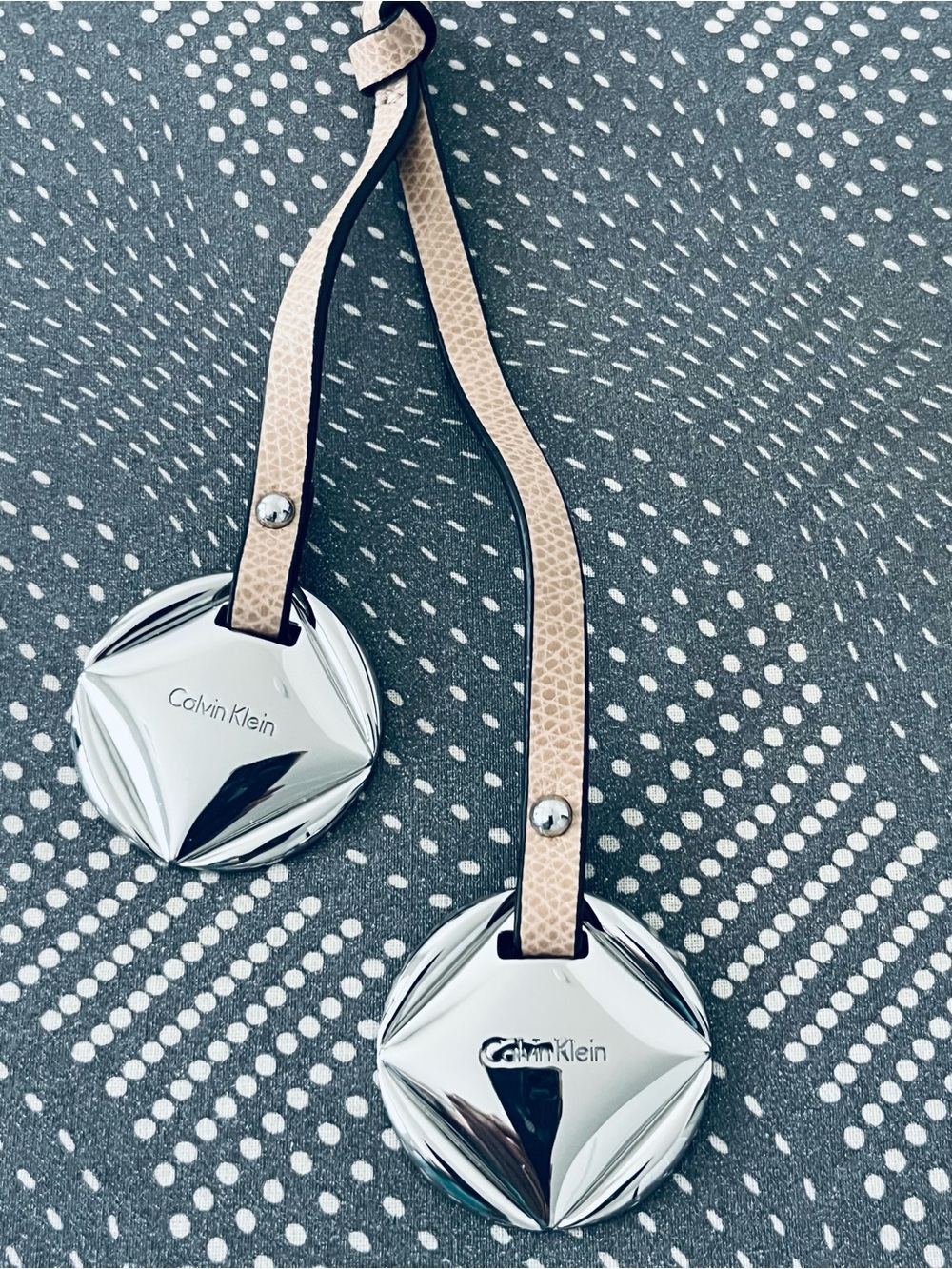 Calvin Klein Silver Circular Logo Tags with Beige Straps